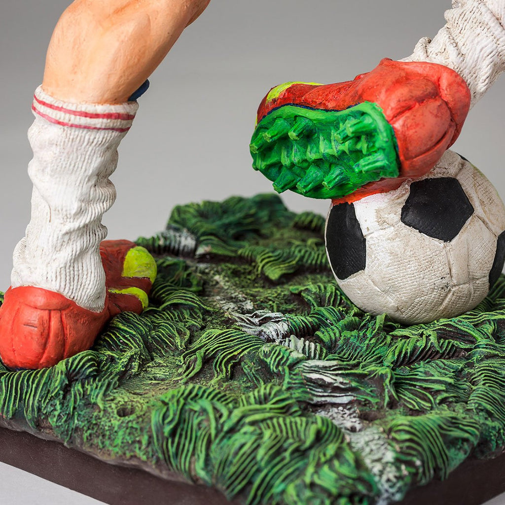 THE FOOTBALL PLAYER