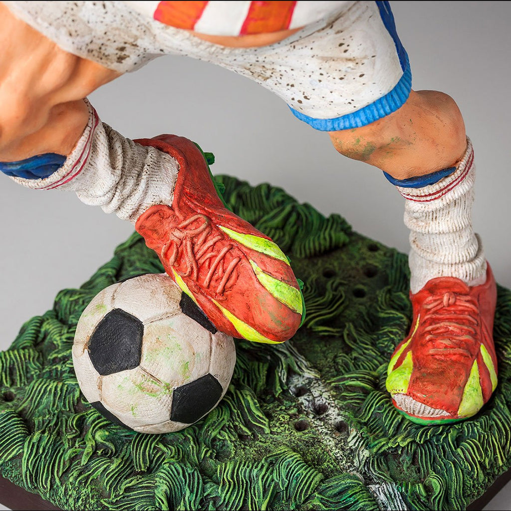 THE FOOTBALL PLAYER