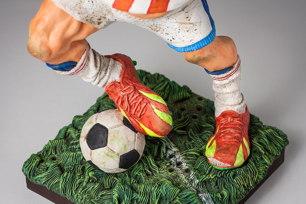 THE FOOTBALL PLAYER (MINI)